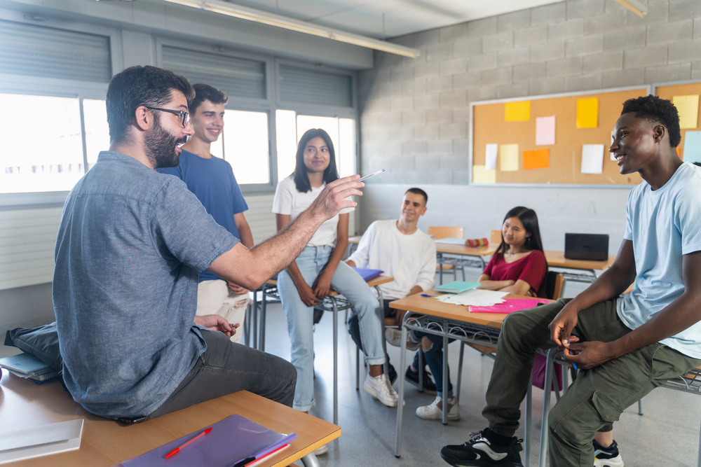 A group of students having a discussion in classroom