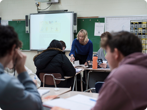 A teacher explains in classroom