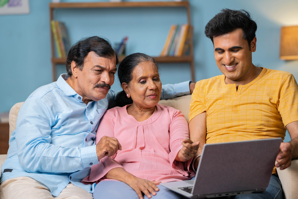 Family look at the laptop screen